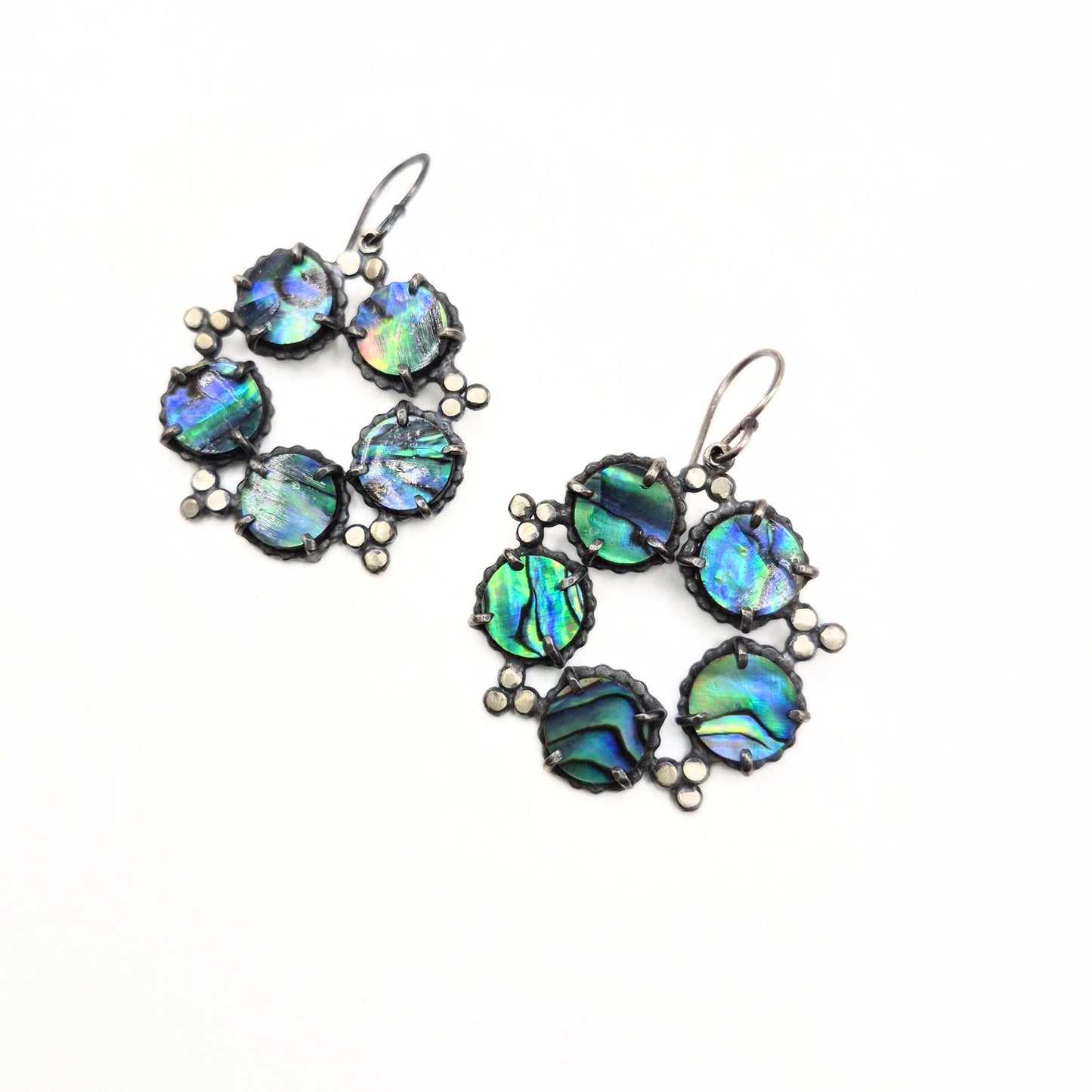 Abalone shell silver earrings on a white background by Alice Scott
