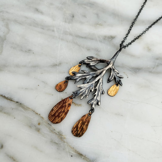 silver carved mugwort necklace with hammered gold fill drops by Alice Scott