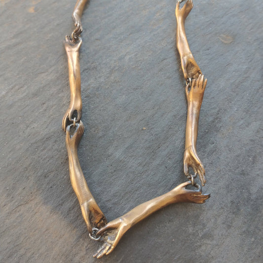 Long Bronze Hands Connecting Necklace